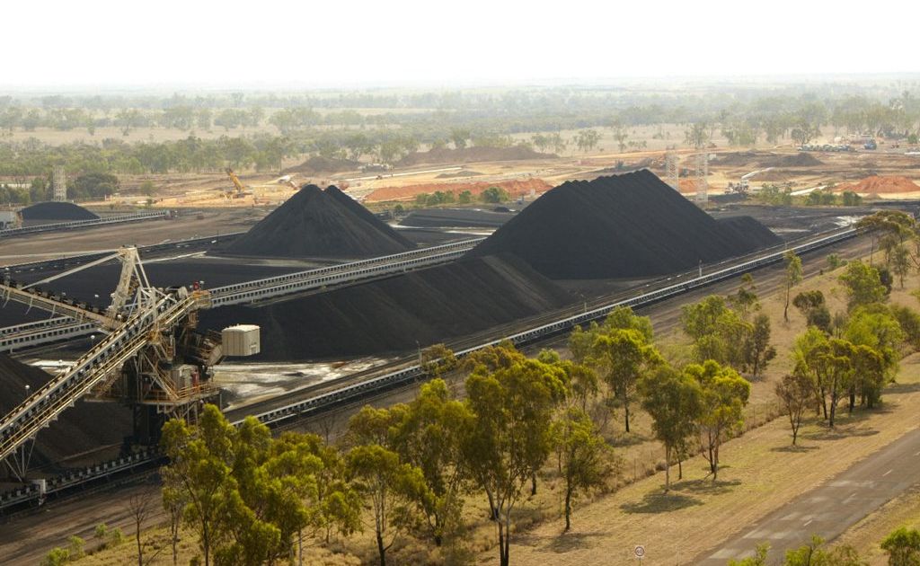 The stacker reclaimer and stockpiles at Kestrel Mine, with extension work visible in the distance. The stacker reclaimer and stockpiles at Kestrel Mine, with extension work visible in the distance.